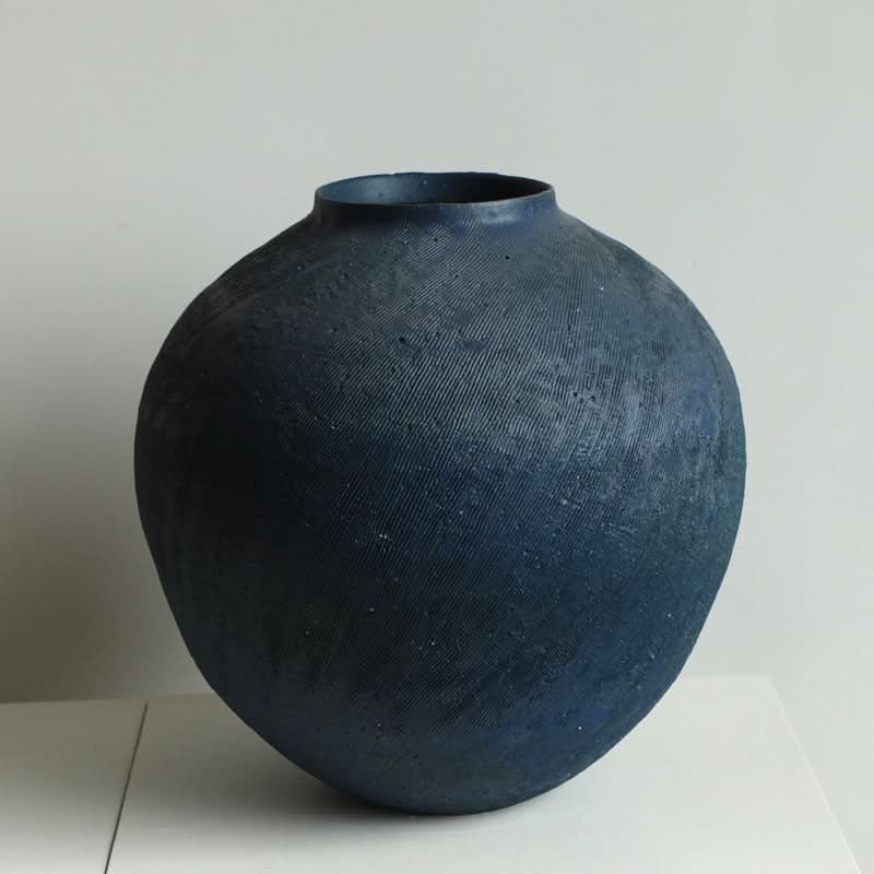 Round Textured Wabi-Sabi Vase in deep blue ceramic with organic lines.