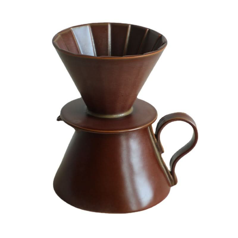 Brown ceramic coffee brewer with folded textile style pour-over cone and handle.