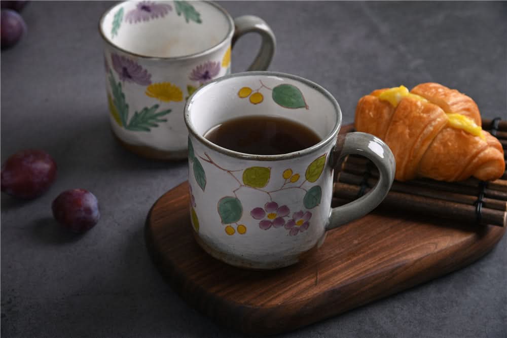 Japanese Underglaze Ceramic Flower Mug, hand-painted floral design, rustic handmade stoneware.