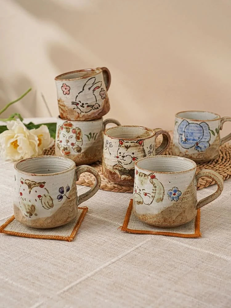 Hand painted coffee mug 11oz with charming animal designs in earthy tones on linen.
