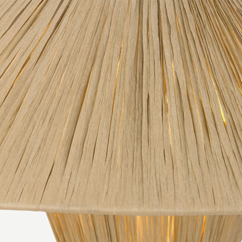 Natural raffia lampshade with a geometric pleated design and warm, diffused light. Home decor.