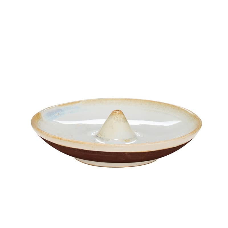 Glazed ceramic incense holder in earthy tones, perfect for home decor.