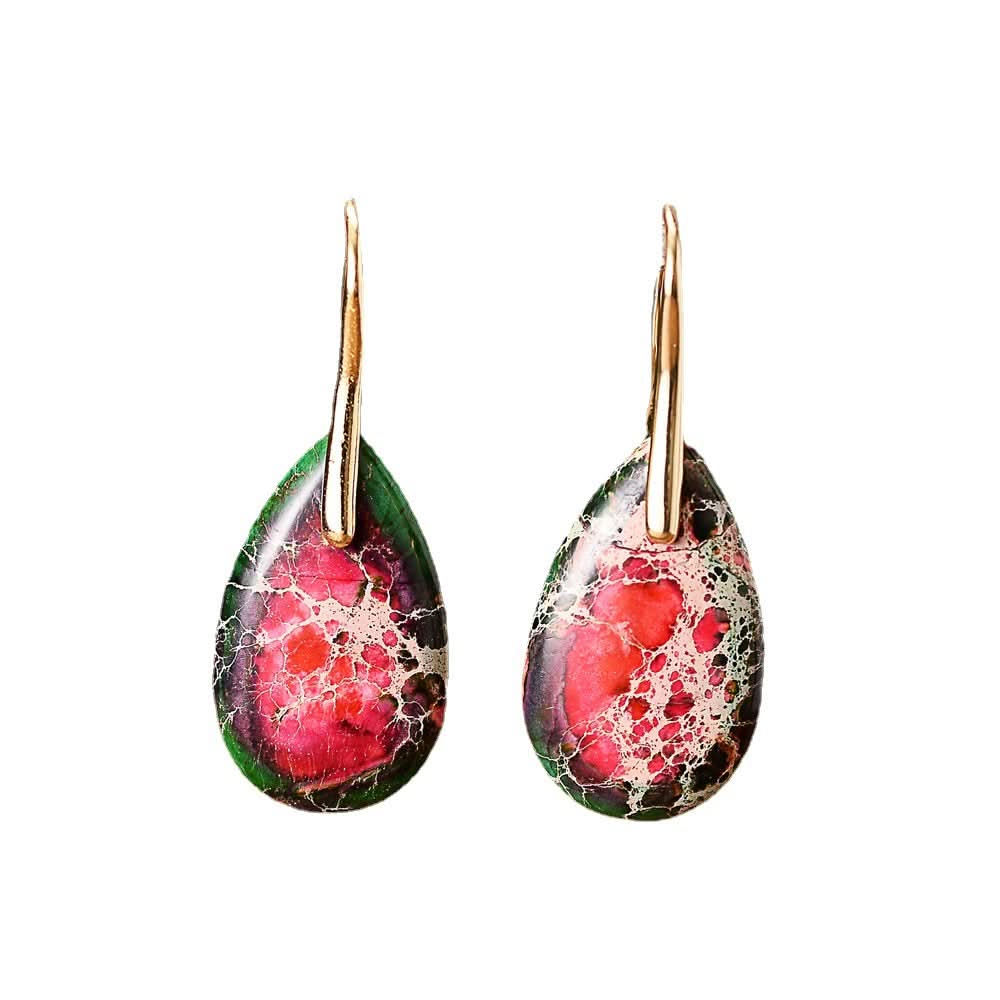 Gold teardrop stone earrings with marbled green and pink stones.