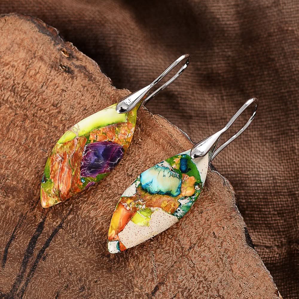 Colorful natural stone earrings with silver hooks, featuring mosaic patterns of green, blue, purple, and orange.