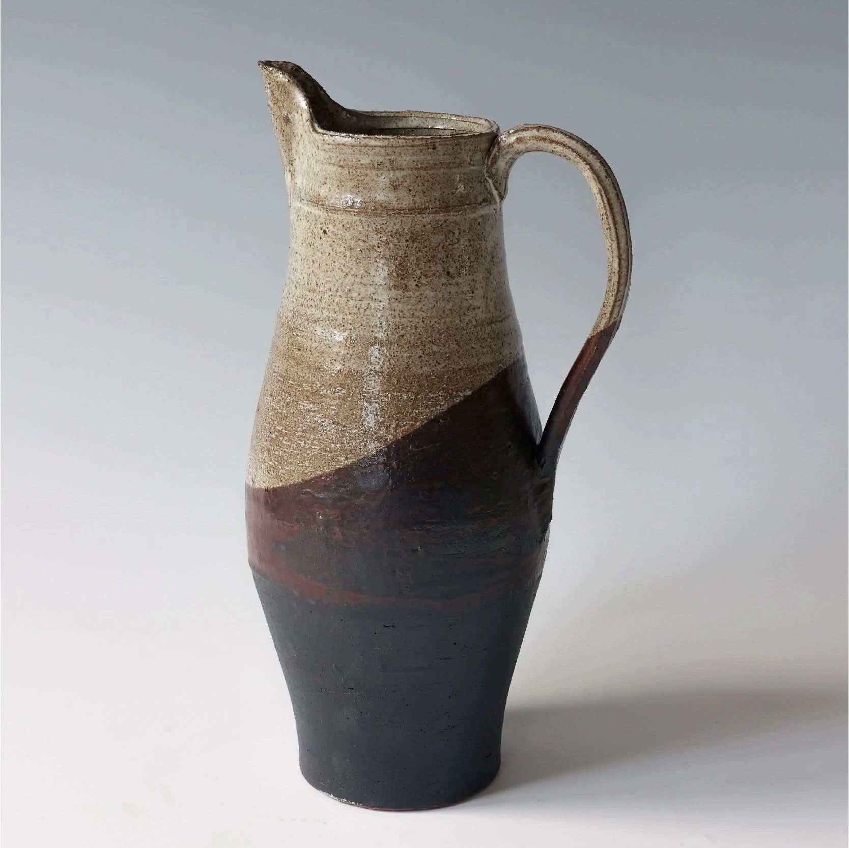 Ceramic Jug Rough Pottery Glaze, with textured beige to dark brown finish on white background.