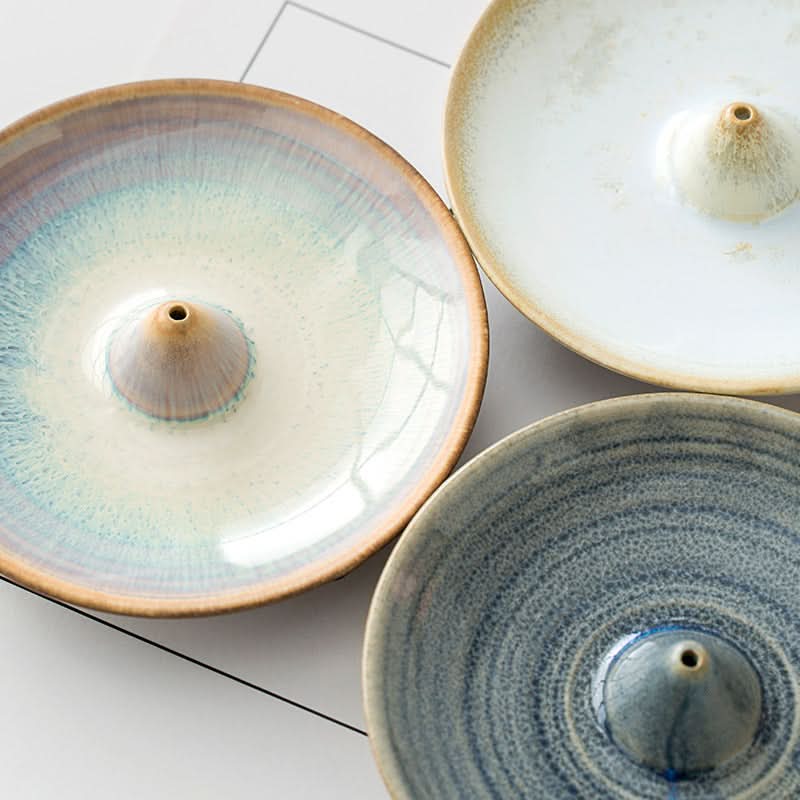 Glazed ceramic incense holder in earthy tones. Home decor essential.