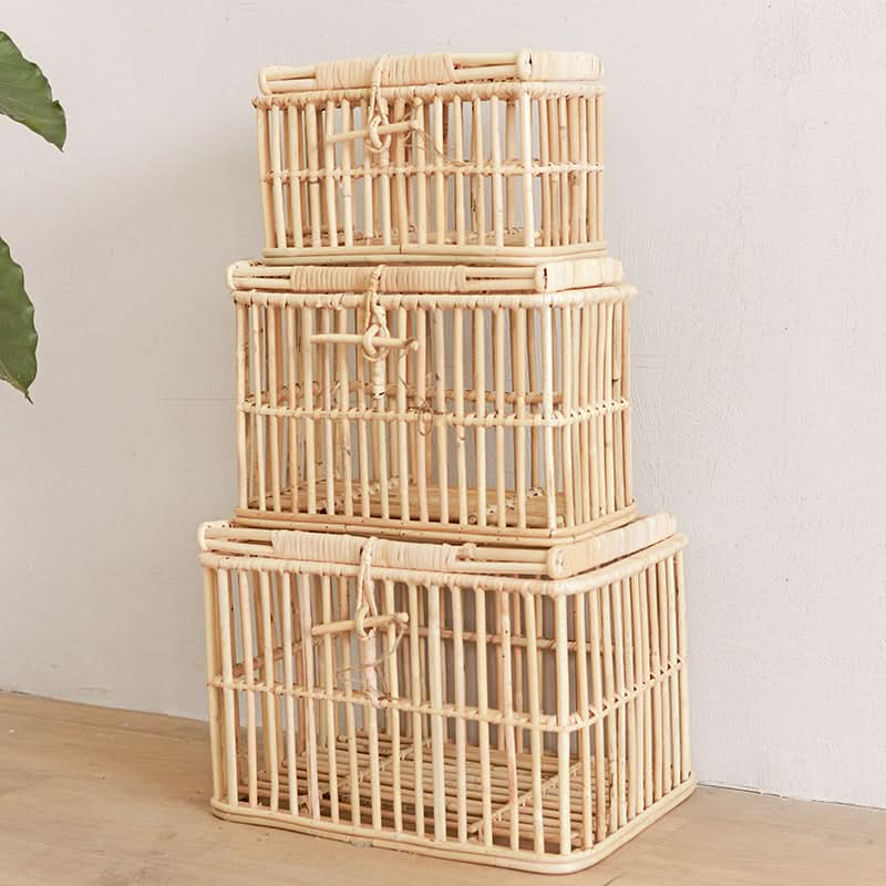 Natural rattan storage boxes with lids stacked, ideal for sundries and clothes.