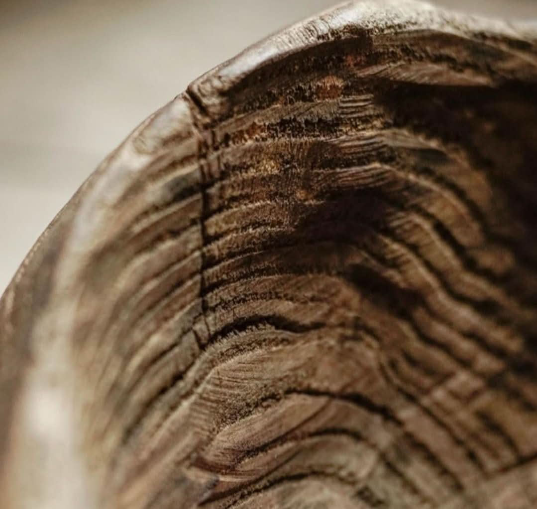 Close-up of rich brown, distressed Wooden Distressed Serving Bowl with visible wood grain texture.