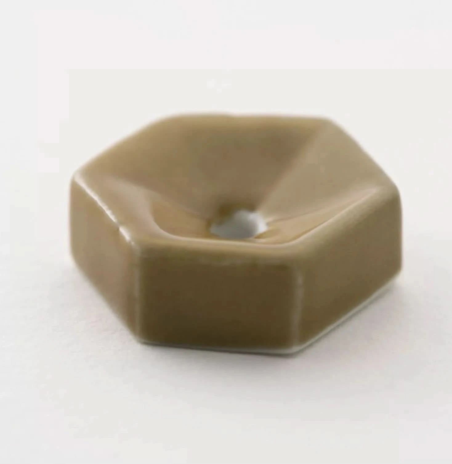 Brown ceramic incense holder made in Japan.