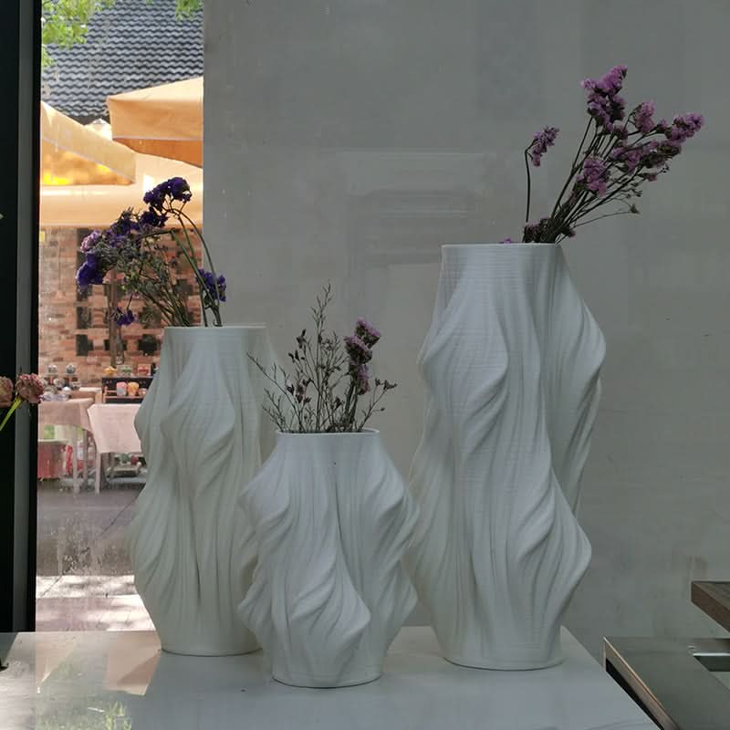 White 3D printed vase made of ceramic with purple dried flowers, modern home decor accent.