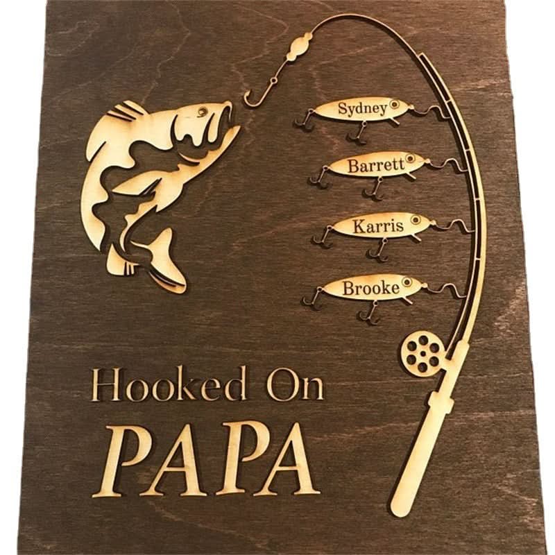 Wooden wall art gift for Father's Day, featuring a fishing theme with personalized names.