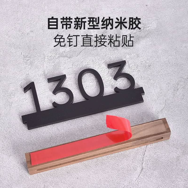 Black numbers on a Walnut Beech custom door plate, with adhesive backing.