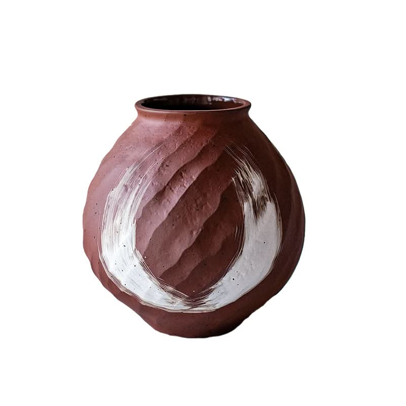 Brown vase with brushed stroke, textured ceramic home decor on white background.