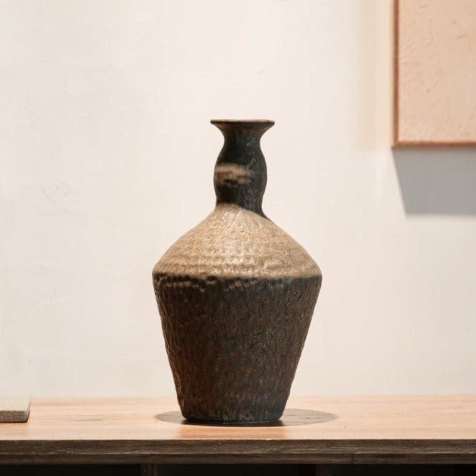Abstract geometric ceramic vase with hammered texture - -