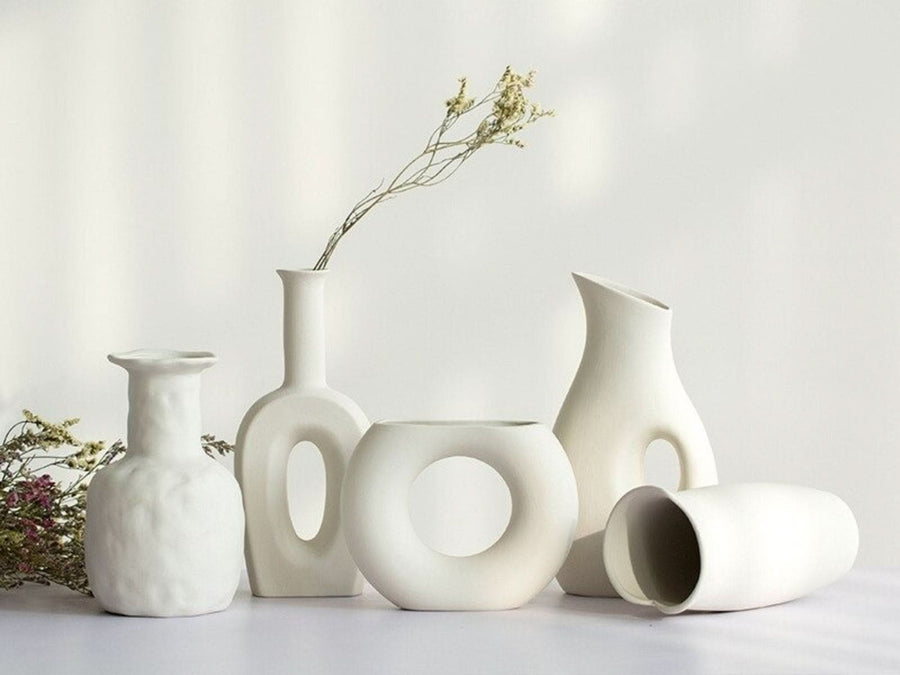 Abstract white vases, decorative, minimalist, and modern. Home decor.