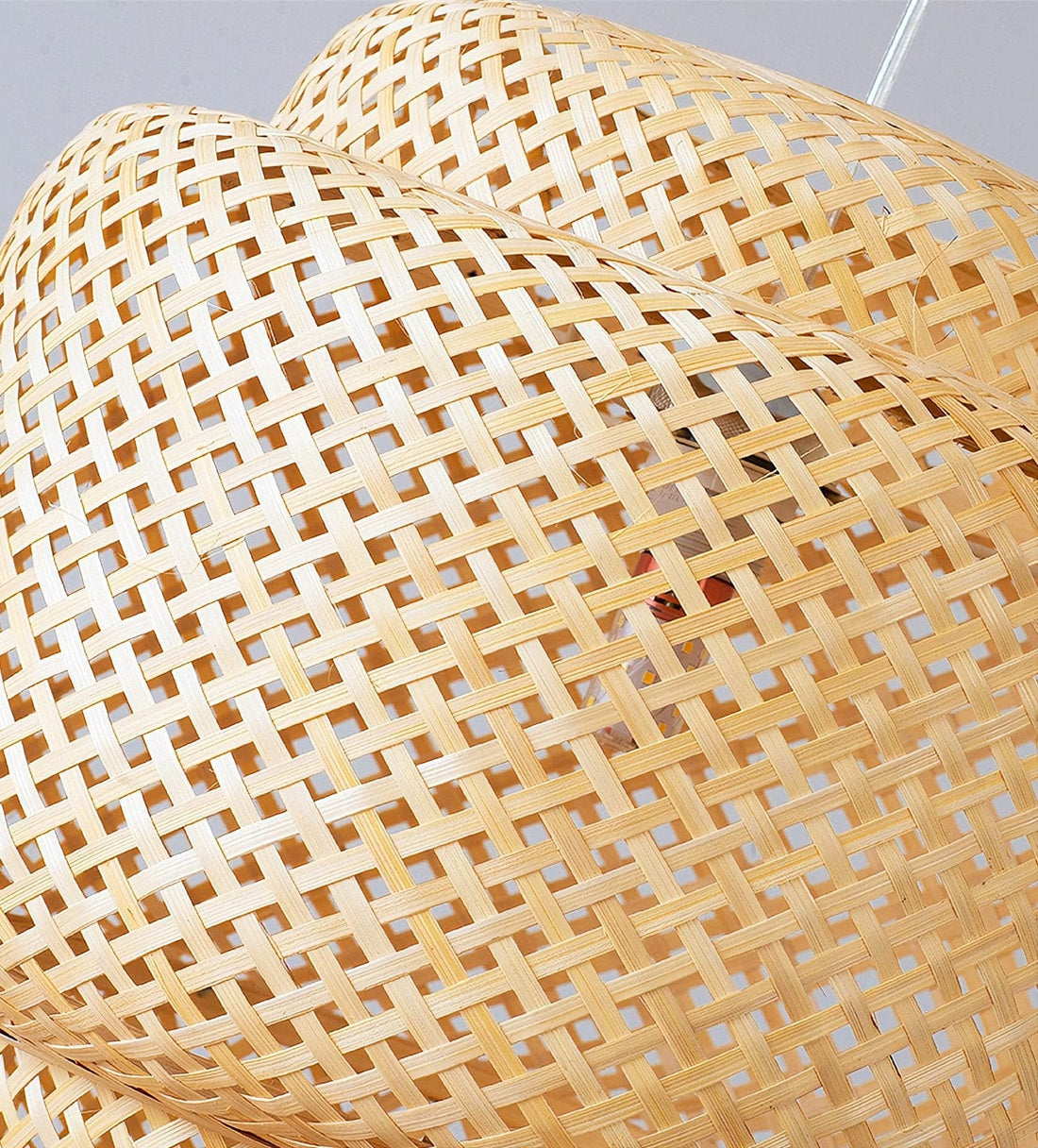 Beige woven bamboo pendant light.