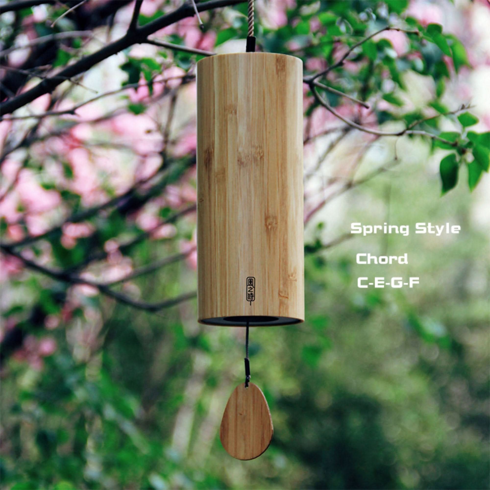 Natural bamboo wind chime with 4 melodies, C-E-G-F chord, hanging outdoors.
