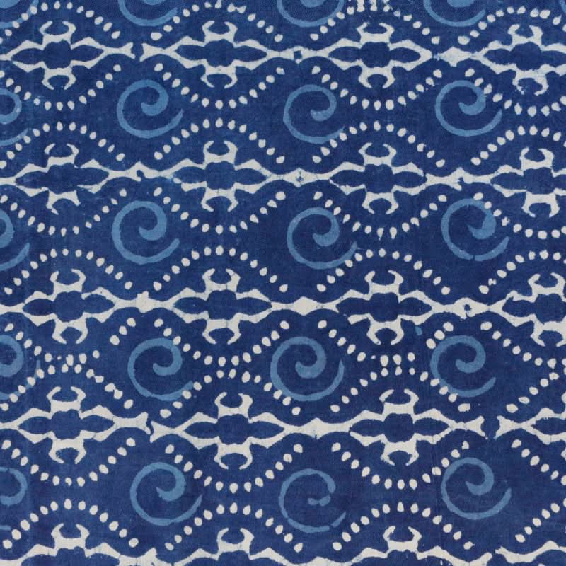 Blue dyed pure cotton fabric, India imported, with white scrolling paisley pattern.