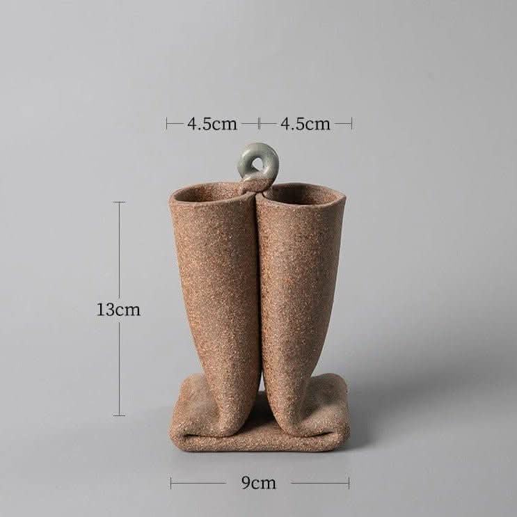 Bent tube textured rough pottery ceramic vase imported from Japan, natural brown finish.