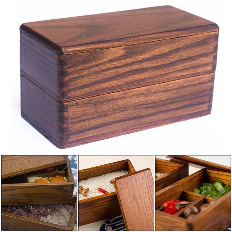 Wooden bento box, brown wood grain, divided compartments.