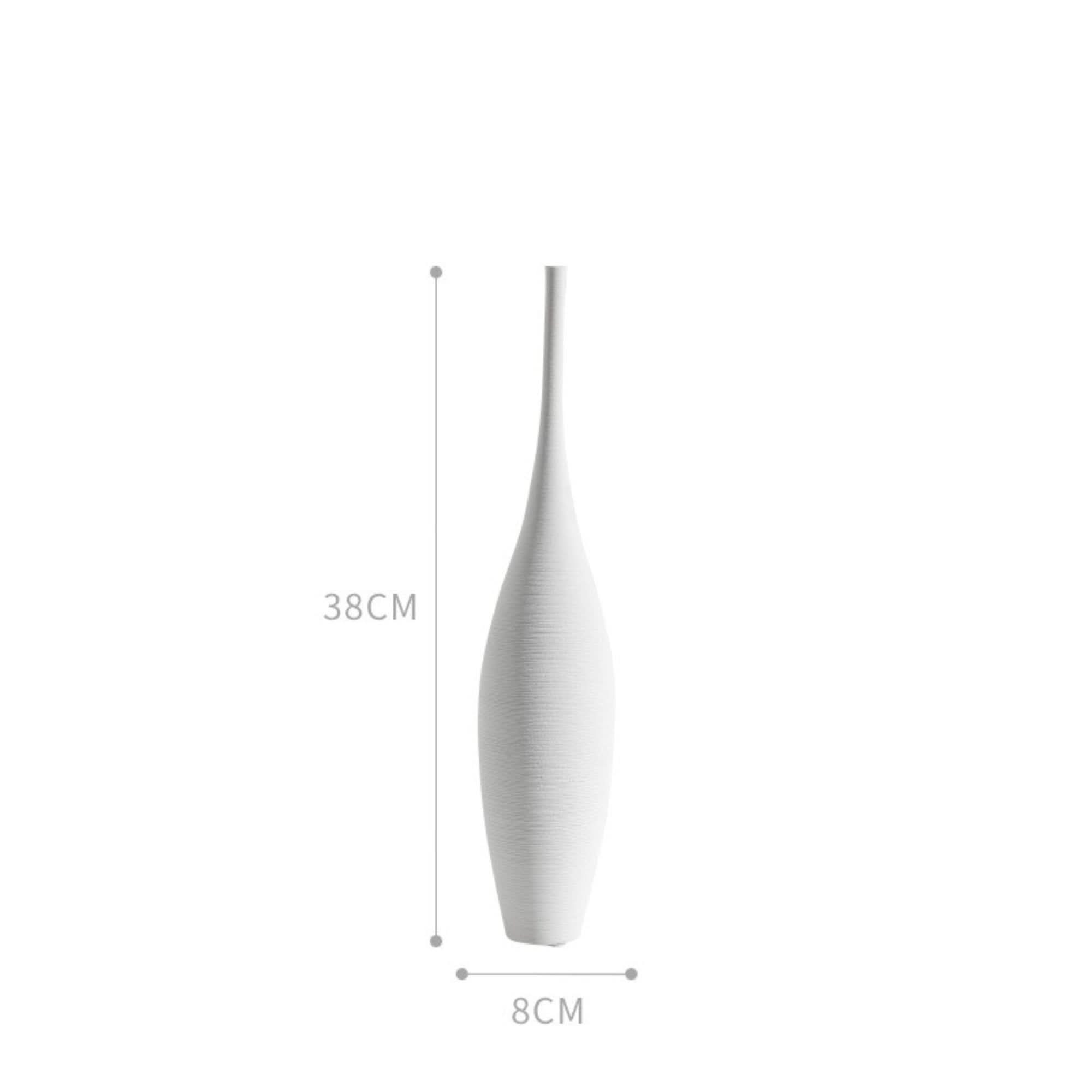 Minimalist white ceramic vase with textured detail.
