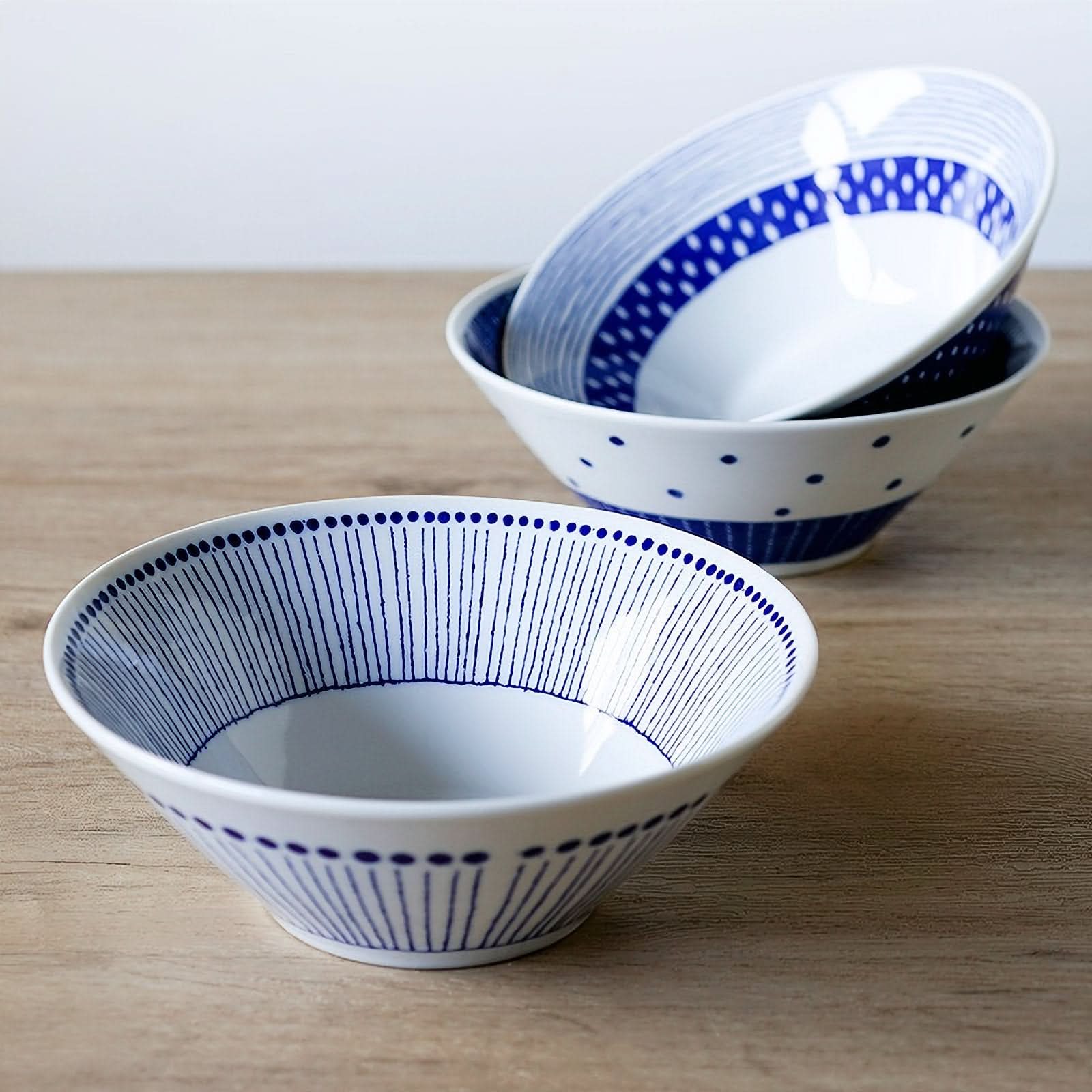 Blue & white ceramic Japanese ramen bowl with vertical lines and dots. Japan imported.