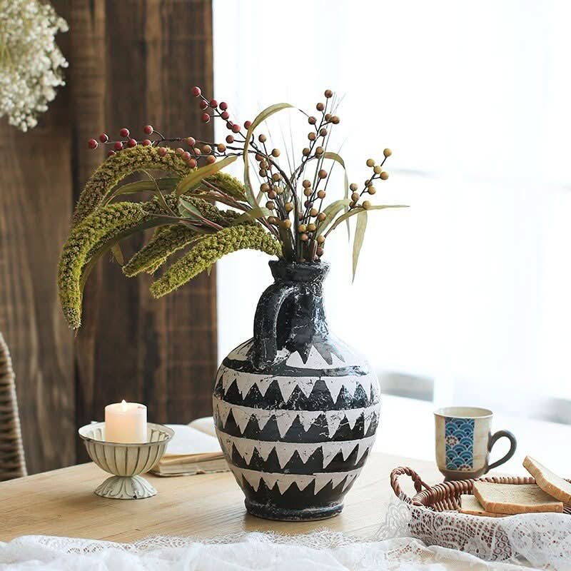 Bold Black and White African Motif Pottery Vase with dried botanicals.