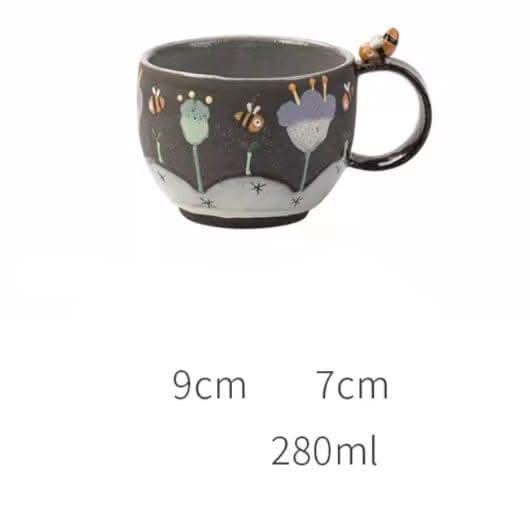 Brown Clay Underglaze Bee Mug, handmade in Japan. Features bees and flowers design.