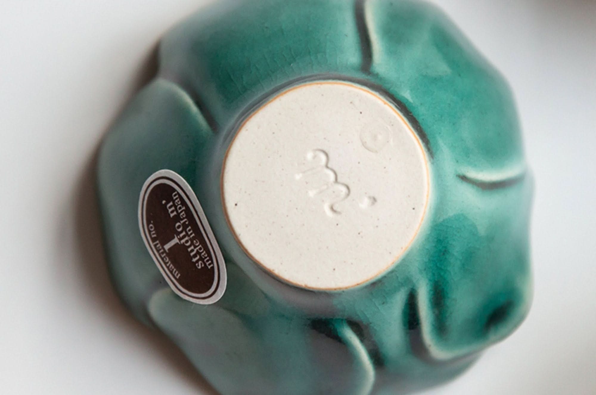 Handmade green Camellia Ceramic Sauce Bowl from Japan, with studio m. logo stamped.