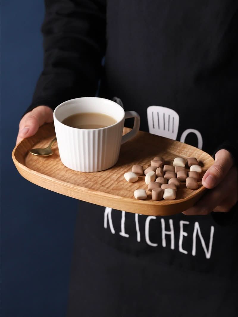 Natural wood carved coffee tray with coffee cup and marshmallows. Farmhouse rustic style.