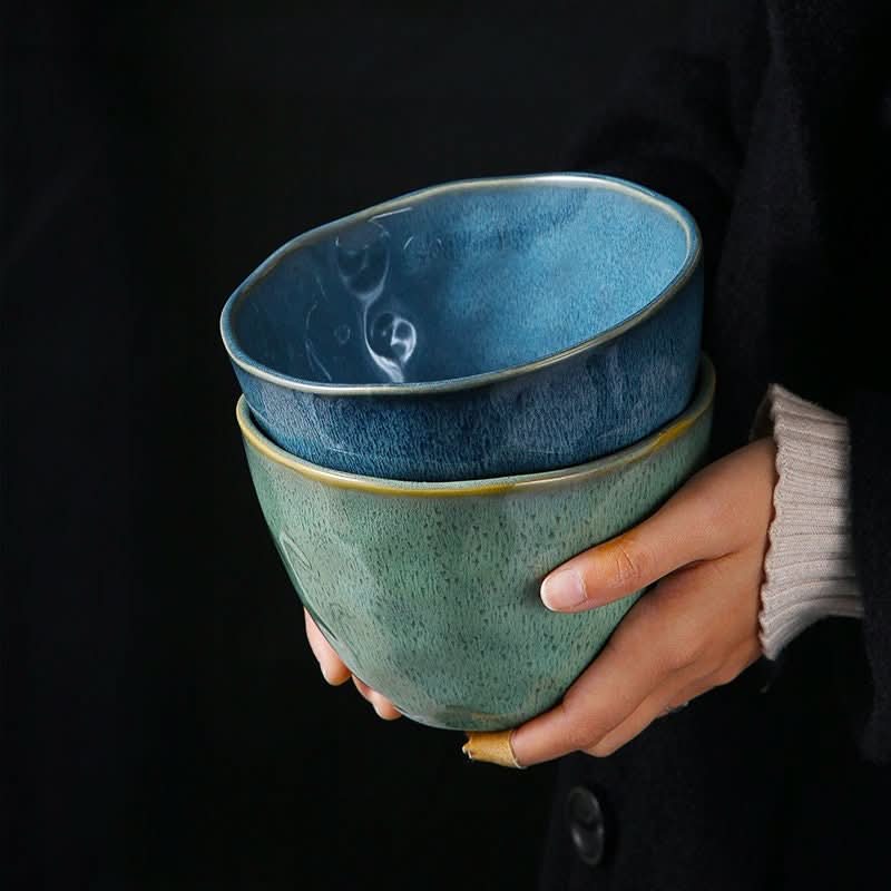Ceramic Blue Glazed 5.9" Bowl, holding two stoneware bowls, blue and green hues.