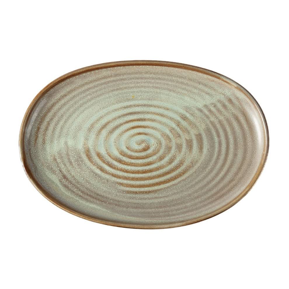 Oval ceramic plate with rustic glaze and swirl pattern. Japanese diner style.