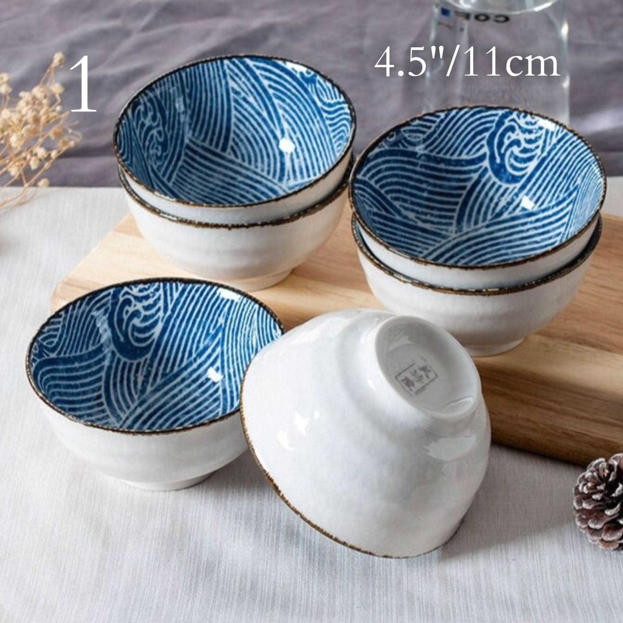 Ceramic glazed 4.5" bowls with Japanese wave illustrations, perfect for noodles or soup.