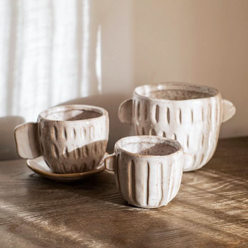 Ceramic irregular flower pot set of 2, rustic white planters for succulents on wooden table.