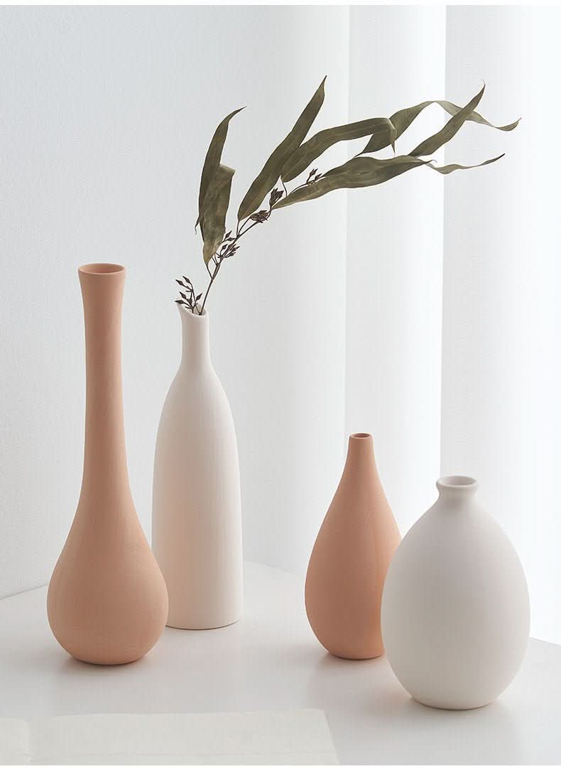 Small Ceramic Vase | Nordic, minimalist decorative vase with single dried eucalyptus branch.