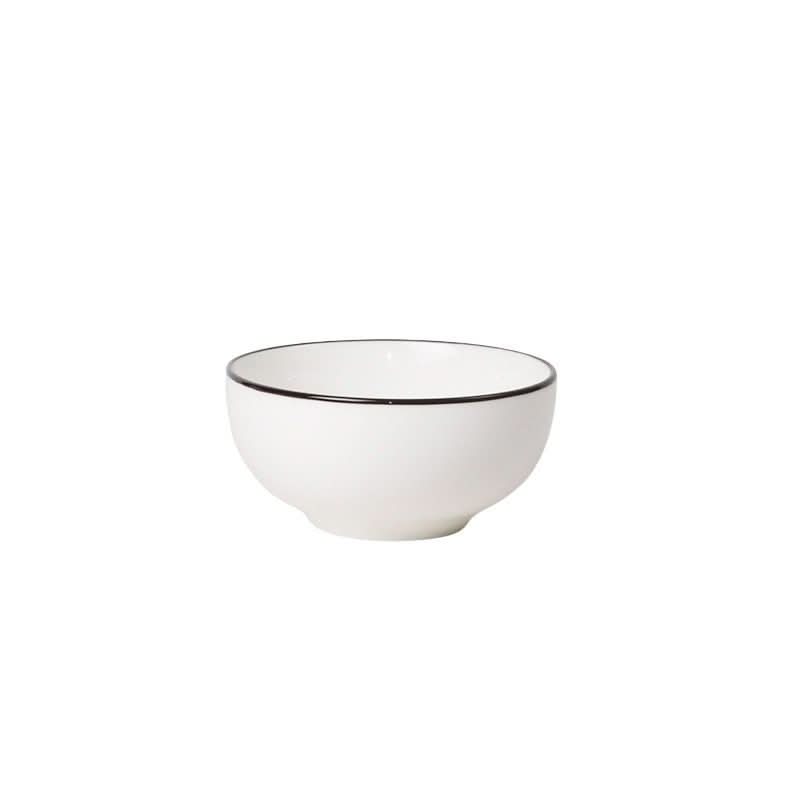 White ceramic bowl made in Japan with black edges, elegant home decor