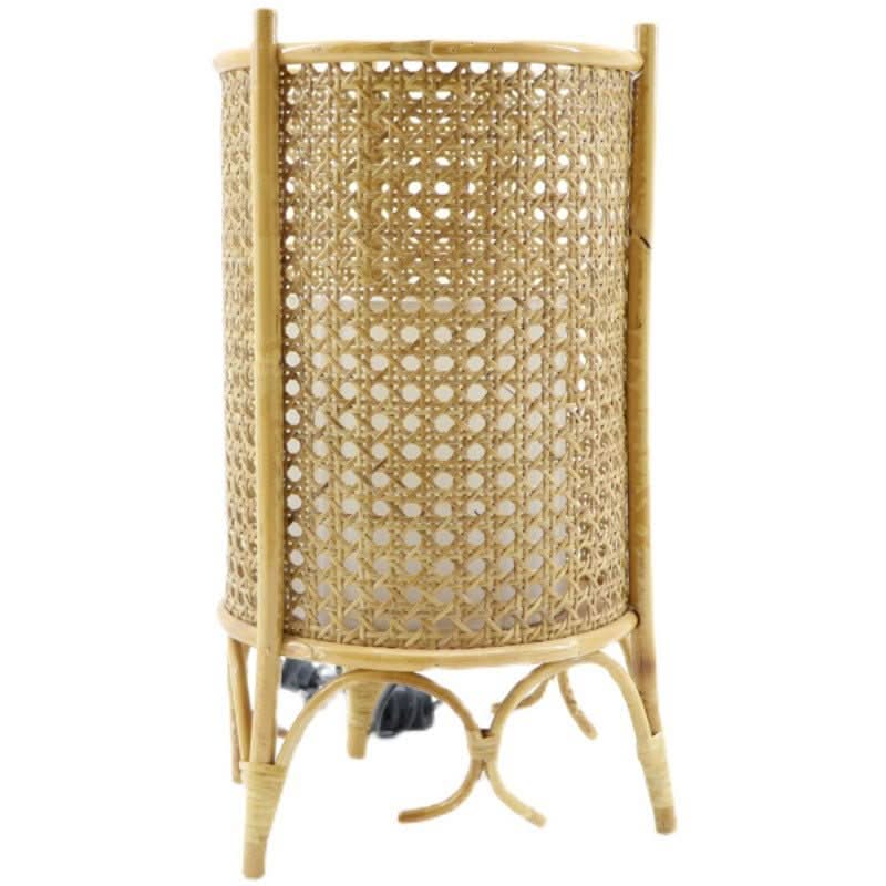Handwoven natural rattan cylindrical table lampshade with three legs.