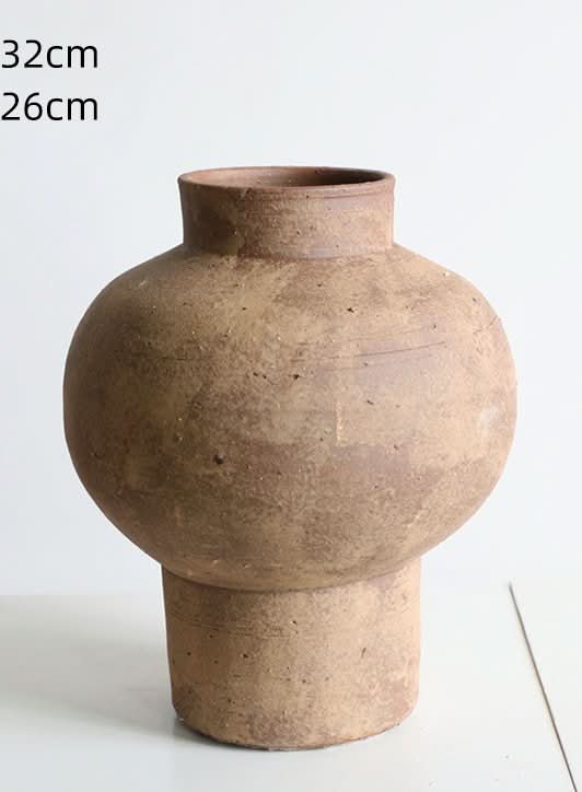 Rustic brown clay cylindrical curved vase, home decor.