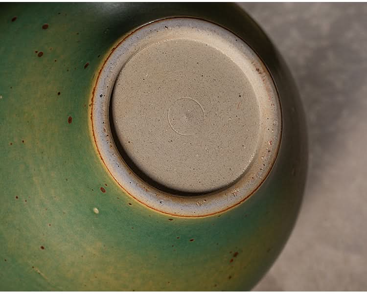 Sage green ceramic round vase with speckled texture, 18.5cm home decor.