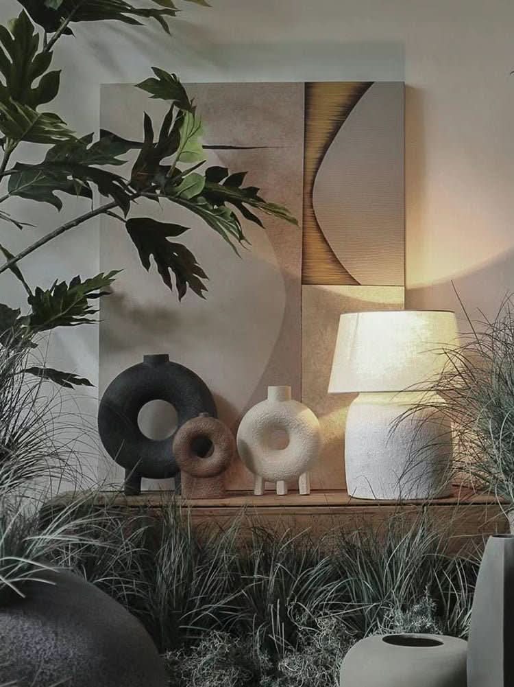 Donut Vase Wabi-Sabi Style rough pottery in black, brown, and white, abstract Nordic geometric decor.