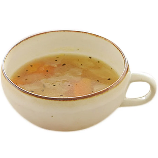 White ceramic Minoyaki bowl cup filled with soup, a Japanese breakfast staple.