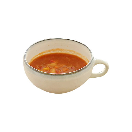 Japan Imported Minoyaki white ceramic single handle soup cup with hearty stew.
