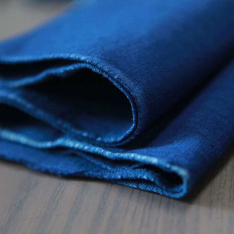 Hand-woven native cotton fabric in blue-grey tones, with hand-twisted yarn.