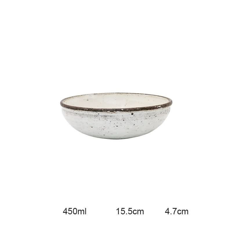 White speckled ceramic bowl, part of the Clay Ceramic Dinnerware Set.