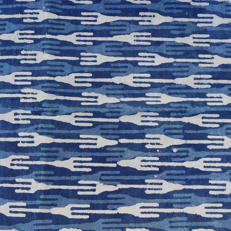 India Imported Blue Dyed Indian Fabric Pure Cotton: White fork pattern on layered blue hues.