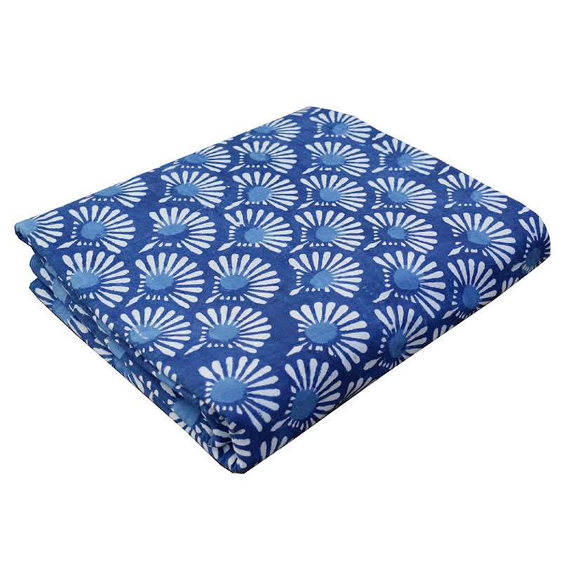 Blue dyed Indian fabric, pure cotton, with a white floral print, for home decor.