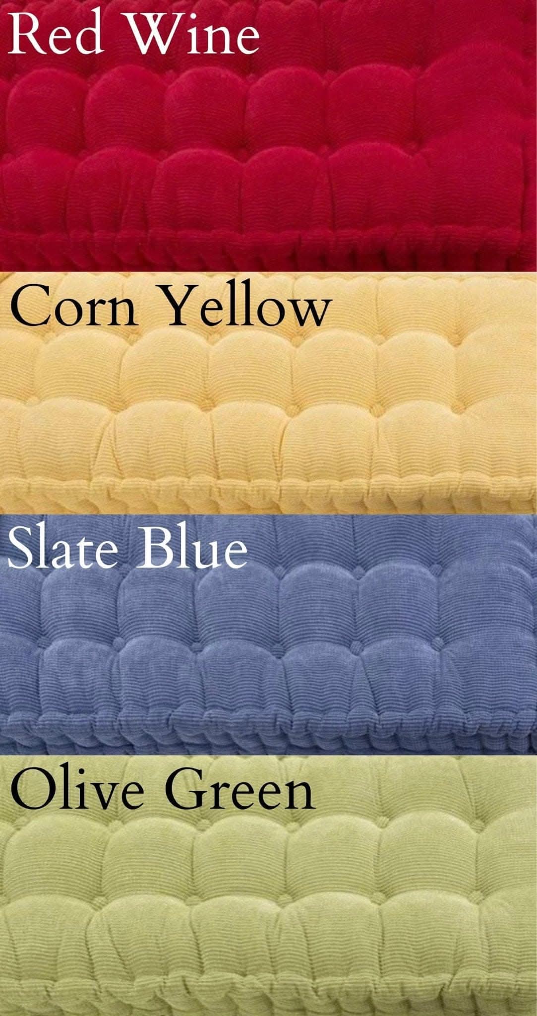 Custom window seat cushions in red wine, corn yellow, slate blue, and olive green corduroy fabric.