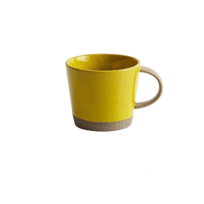 Yellow glazed clay mug, handmade ceramic Nordic latte mug with textured base.