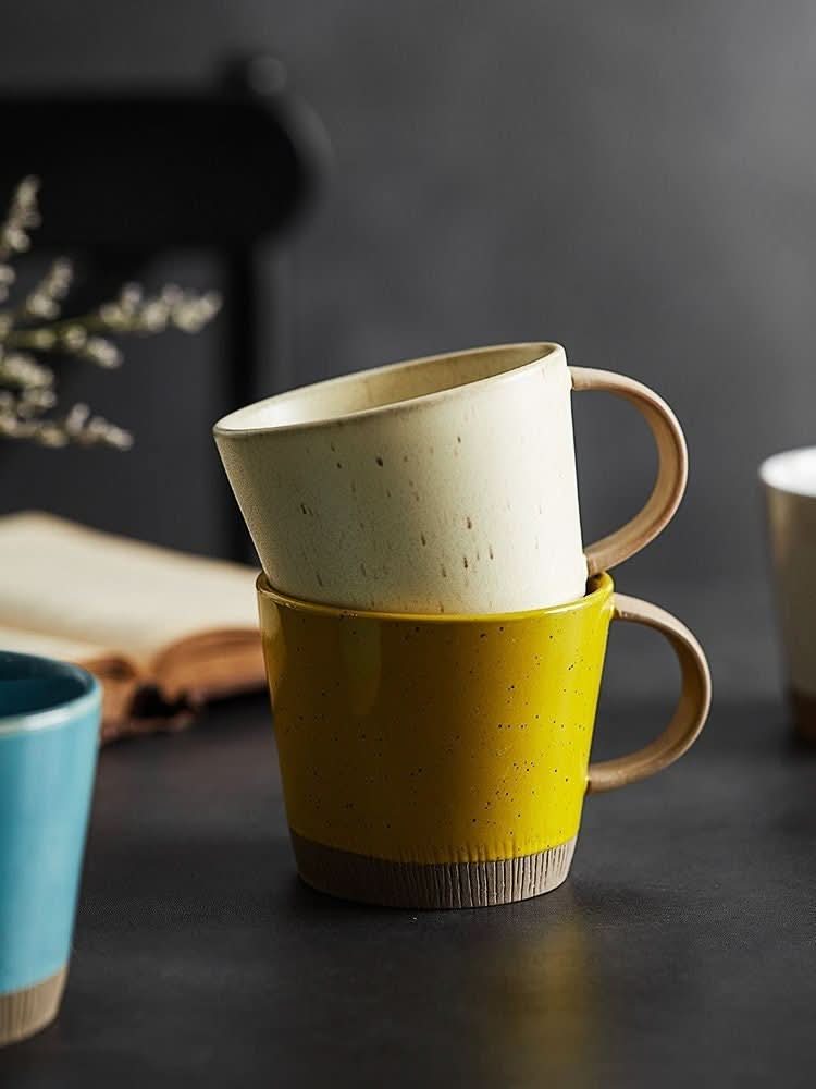 Handmade yellow and cream glazed clay mugs, Nordic style, hand thrown ceramic latte mugs.