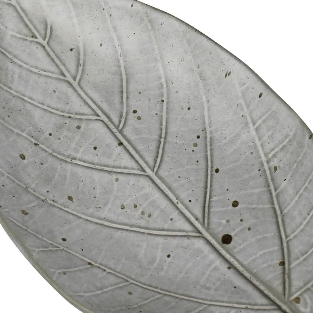 Gray begonia leaf ceramic serving tray with realistic veining detail.